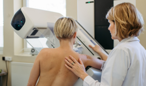 A woman having a mammogram